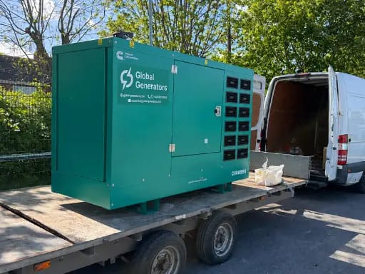 A Cummins C66D5EQ canopied diesel generator loaded on a trailer ready for transport to a Lincoln poultry farm