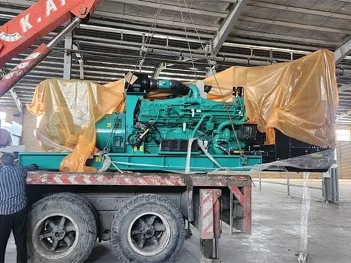 Cummins open-type diesel generators being offloaded into storage after arriving in the UAE